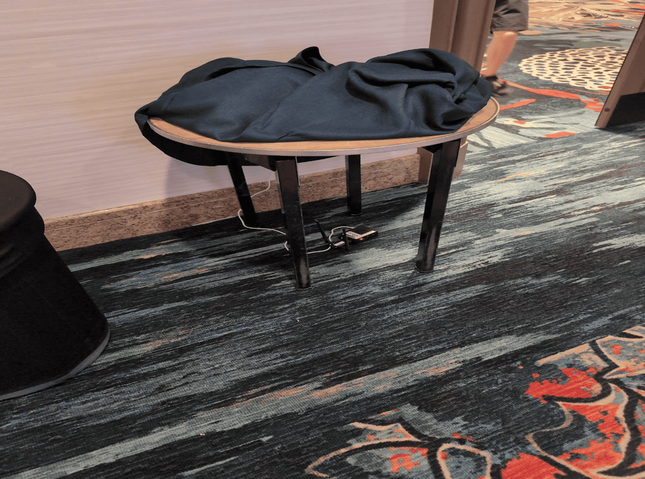 One agent deployed to a room under a covered table